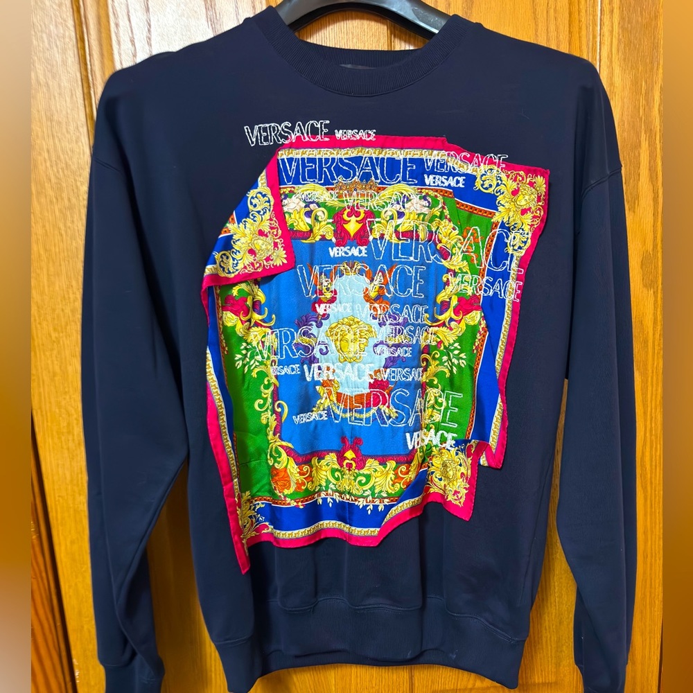 Size small Versace crew neck sweater